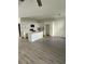 Bright kitchen showcases white cabinets, a center island with seating, and stainless steel appliances at 4011 Redan Rd # 9, Stone Mountain, GA 30083