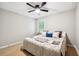 Comfortable bedroom with hardwood floors and large windows at 4742 West Dr, Forest Park, GA 30297