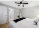 Bedroom features hardwood floors, ceiling fan and natural light at 4742 West Dr, Forest Park, GA 30297