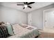 Bedroom featuring natural light, ceiling fan, closet, and connecting door at 4742 West Dr, Forest Park, GA 30297