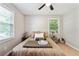 Inviting bedroom with sunlit windows and stylish decor at 4742 West Dr, Forest Park, GA 30297