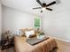 Sunlit bedroom with windows and stylish decor at 4742 West Dr, Forest Park, GA 30297