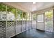 Relaxing screened porch with neutral colors at 4742 West Dr, Forest Park, GA 30297