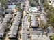 Aerial view of an apartment complex, with street, and amenities including a swimming pool and tennis court at 6851 Ne Roswell Rd # C4, Atlanta, GA 30328