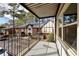 Private balcony with a view of surrounding buildings and parking, featuring a metal railing at 6851 Ne Roswell Rd # C4, Atlanta, GA 30328