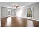 Bright and spacious bedroom with hardwood floors and large windows at 6851 Ne Roswell Rd # C4, Atlanta, GA 30328