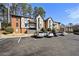 Attractive exterior featuring well-manicured landscaping, balconies, and ample parking at 6851 Ne Roswell Rd # C4, Atlanta, GA 30328