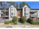Stylish condo building with traditional design, landscaping, balconies, and visible street access at 6851 Ne Roswell Rd # C4, Atlanta, GA 30328