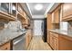 Well-lit kitchen with granite countertops, stainless steel appliances, and plenty of cabinet space at 6851 Ne Roswell Rd # C4, Atlanta, GA 30328