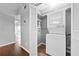 A compact laundry area features a stacked washer and dryer unit at 6851 Ne Roswell Rd # C4, Atlanta, GA 30328