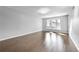 Bright living room with bay window and wood floors at 6851 Ne Roswell Rd # C4, Atlanta, GA 30328