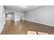 Spacious open living area with hardwood flooring, neutral walls, and ample natural light at 6851 Ne Roswell Rd # C4, Atlanta, GA 30328