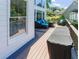 Outdoor deck with comfortable seating and a view of the surrounding neighborhood at 10635 Sugar Crest Ave, Johns Creek, GA 30097