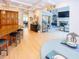 Open floor plan showing the kitchen, dining area, and living room with fireplace at 10635 Sugar Crest Ave, Johns Creek, GA 30097