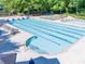 Large, inviting swimming pool and splashpad, perfect for recreation and relaxation at 10635 Sugar Crest Ave, Johns Creek, GA 30097