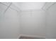Walk-in closet with wire shelving providing ample storage space at 4958 Villager Ln, Stone Mountain, GA 30083