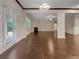 Spacious living room with hardwood floors, fireplace, and abundant natural light at 1477 Harlequin Way, Stockbridge, GA 30281