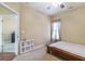 Bedroom featuring a ceiling fan and a doorway that looks into the rest of the home at 2703 Brookhavenrun Cir, Duluth, GA 30097