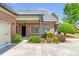 Charming brick home with well-maintained landscaping, inviting front entrance, and a clean, modern aesthetic at 2703 Brookhavenrun Cir, Duluth, GA 30097