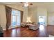 Spacious living room boasts hardwood floors, high ceilings, and neutral decor at 2703 Brookhavenrun Cir, Duluth, GA 30097
