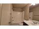 Bathroom with shower and tub combo at 3456 Sardis Bend Dr, Buford, GA 30519