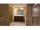 A Primary bath featuring a double sink vanity, a soaking tub, a glass shower, and a walk-in closet at 3456 Sardis Bend Dr, Buford, GA 30519