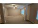 Large bedroom with neutral carpet and large windows at 3456 Sardis Bend Dr, Buford, GA 30519
