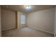 Carpeted bedroom with window and ceiling light at 3456 Sardis Bend Dr, Buford, GA 30519
