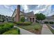 A beautifully landscaped clubhouse featuring brick and stone accents, ideal for community gatherings at 3456 Sardis Bend Dr, Buford, GA 30519