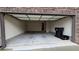 A spacious garage with access to inside the home and space for parking and storage at 3456 Sardis Bend Dr, Buford, GA 30519
