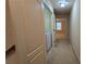 Second floor hallway features laundry and bedrooms at 3456 Sardis Bend Dr, Buford, GA 30519