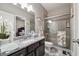 Granite countertop bathroom showcasing a glass shower and decorative accents at 3670 Casual Ridge Way, Loganville, GA 30052