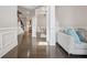 Inviting home foyer featuring gleaming hardwood floors and elegant trim at 3670 Casual Ridge Way, Loganville, GA 30052