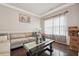 Cozy living room with hardwood floors, a large window, and stylish furnishings at 3670 Casual Ridge Way, Loganville, GA 30052
