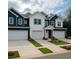 Charming townhomes with manicured lawns and welcoming curb appeal on a sunny day at 4011 Redan Rd # 10, Stone Mountain, GA 30083