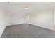 Bedroom with neutral carpet, natural light, and a walk-in closet at 401 Carrera Ln, Acworth, GA 30102