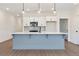 Bright kitchen featuring a stylish island, modern appliances, and a tiled backsplash at 401 Carrera Ln, Acworth, GA 30102