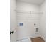 Laundry room with overhead shelving, connections, and vinyl floors at 401 Carrera Ln, Acworth, GA 30102