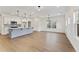 Spacious living area with hardwood floors, recessed lighting, and abundant natural light at 401 Carrera Ln, Acworth, GA 30102