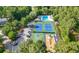 Aerial view of community amenities, including pool, tennis courts, playground, and convenient parking at 5661 Fairwood Nw Dr, Acworth, GA 30101