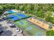 Community amenities featuring a pool, tennis courts, playground, and basketball court offer recreational opportunities at 5661 Fairwood Nw Dr, Acworth, GA 30101