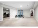 Spacious basement area featuring a workout space and a separate office area, offering versatility at 5661 Fairwood Nw Dr, Acworth, GA 30101