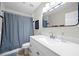 Well-lit bathroom with a shower, vanity, and updated fixtures, combining style and functionality at 5661 Fairwood Nw Dr, Acworth, GA 30101