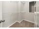 Walk-in closet featuring ample shelving for storage at 7020 Walnut Mill Lndg, Cumming, GA 30040