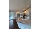 Well-appointed kitchen featuring granite countertops, stainless steel appliances, and ample cabinet space at 7020 Walnut Mill Lndg, Cumming, GA 30040