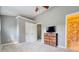 Bedroom featuring plush carpet, double closets, and an en-suite bathroom entrance at 1207 Penhurst Way, Lawrenceville, GA 30043