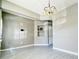 Bright dining area featuring stylish decor, modern flooring and neutral walls at 1207 Penhurst Way, Lawrenceville, GA 30043