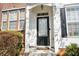 Inviting front door with decorative accents and classic architectural details at 1207 Penhurst Way, Lawrenceville, GA 30043