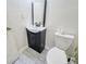 Efficient half bathroom with modern sink, cabinet and toilet at 1207 Penhurst Way, Lawrenceville, GA 30043