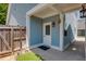 Charming home featuring a covered front door and blue horizontal siding at 230 Ryan Ln, Covington, GA 30014